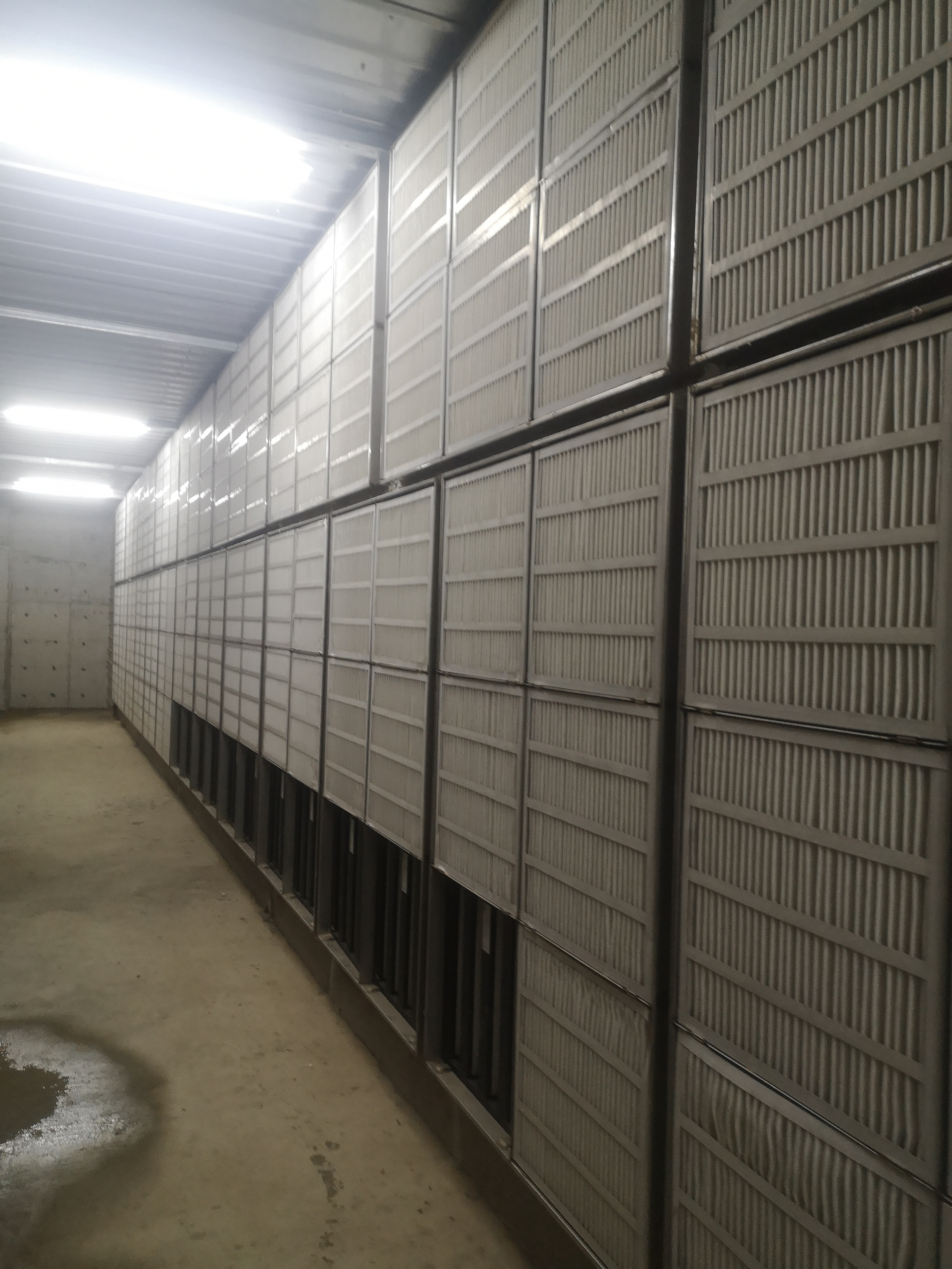 Livestock building modular air filtration wall