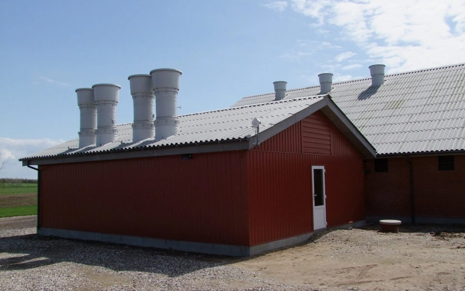 biological air scrubber beside pig house